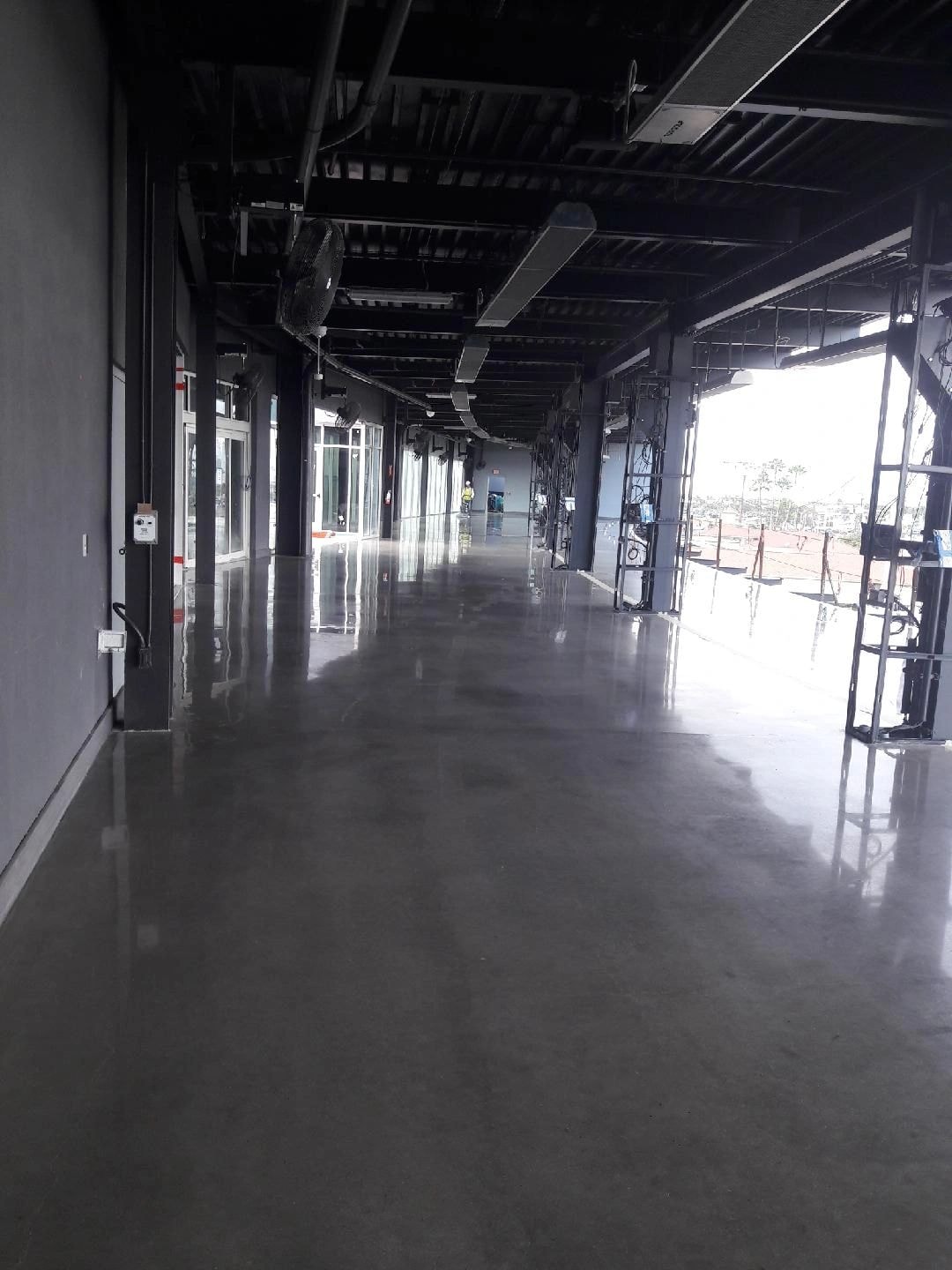 Empty industrial corridor with polished concrete floor