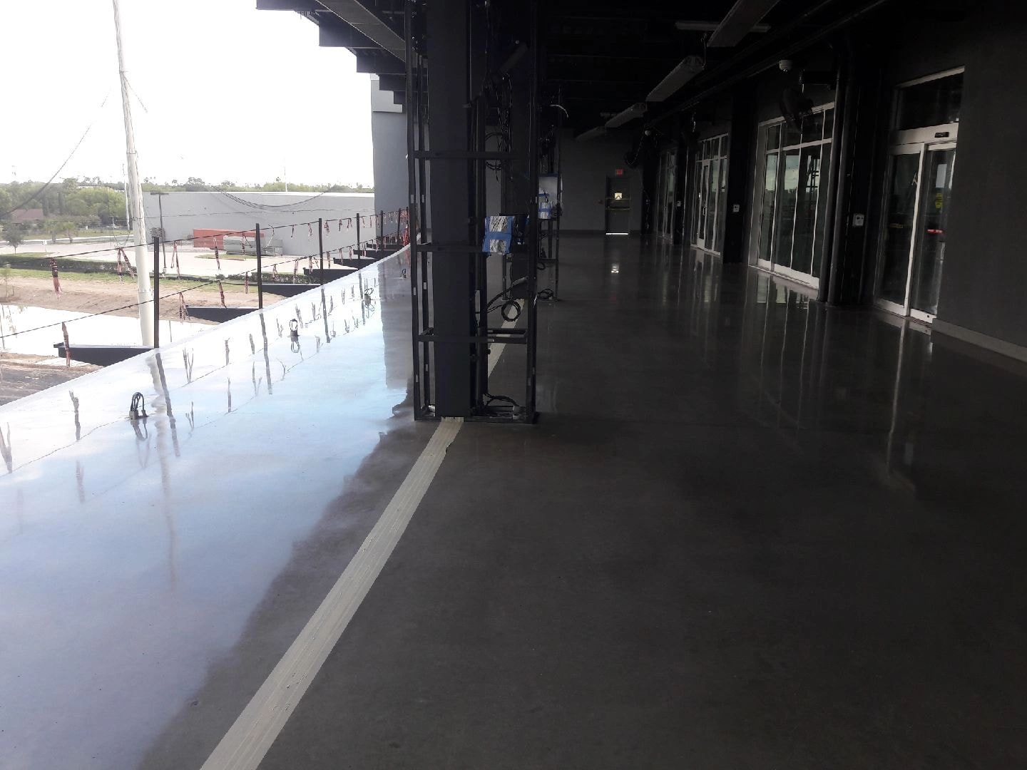 Waterfront building interior with polished concrete floor